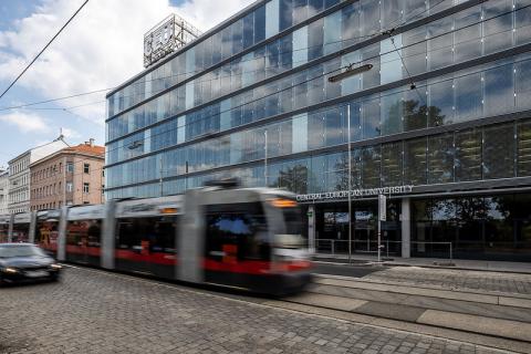 Blurry image of Vienna tram passing by CEU campus.